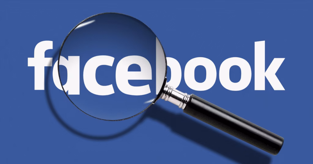 Facebook logo viewed through a magnifying glass, representing understanding how Facebook works