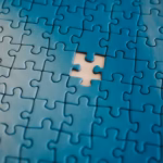 A piece of a puzzle with a missing piece