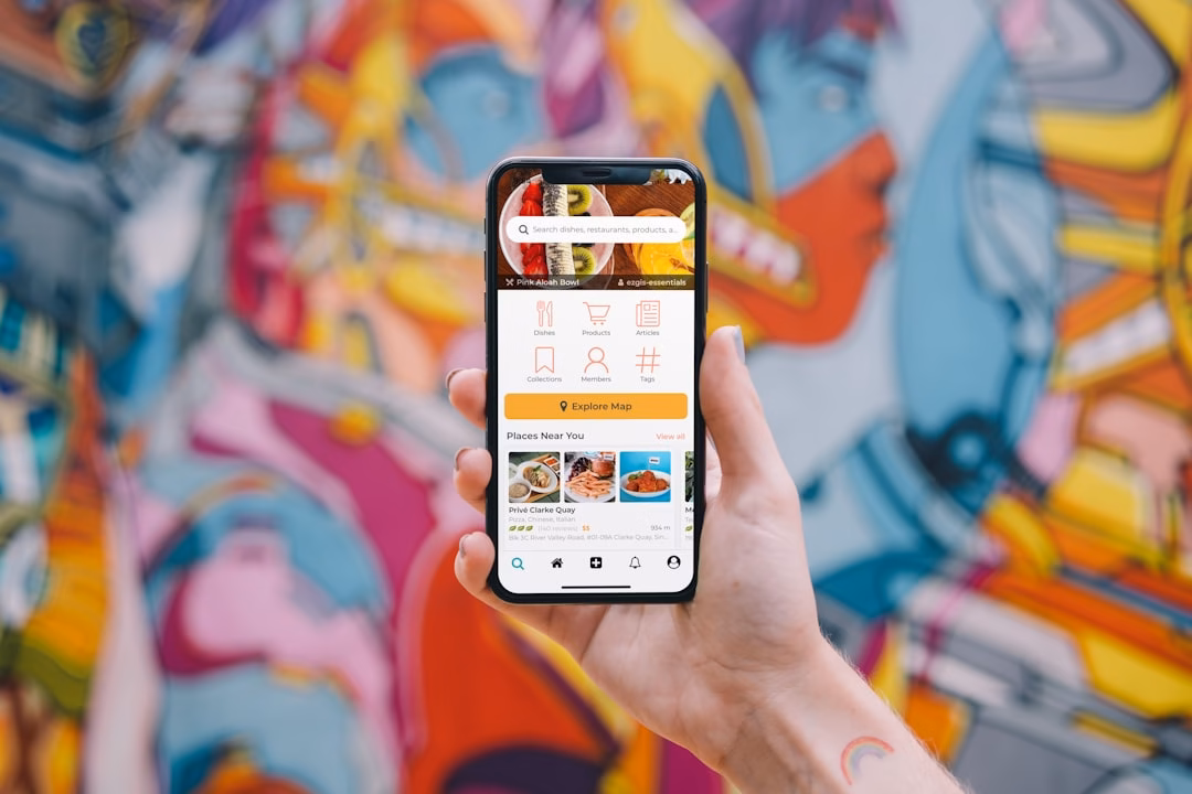 Person holding a smartphone interacting with a mobile app