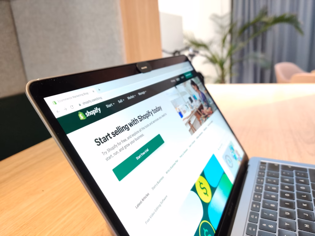Shopify development company building a custom online store on a laptop