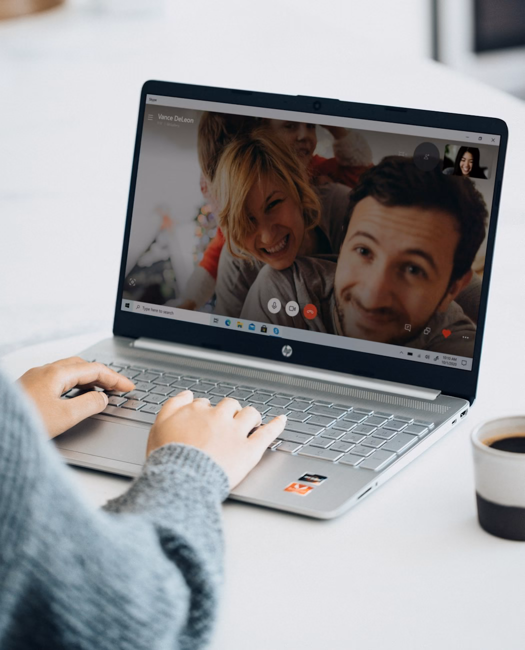 Video call with a client on a laptop