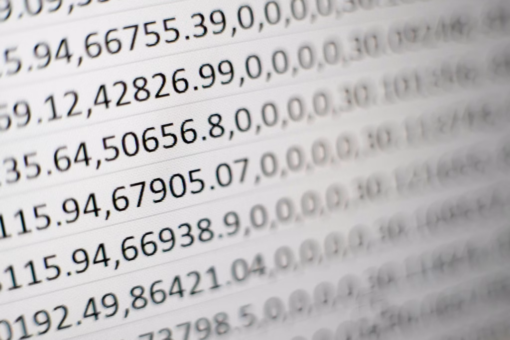 Printed rows of comma-separated numbers, like a CSV prepared for a Google Ads Editor import