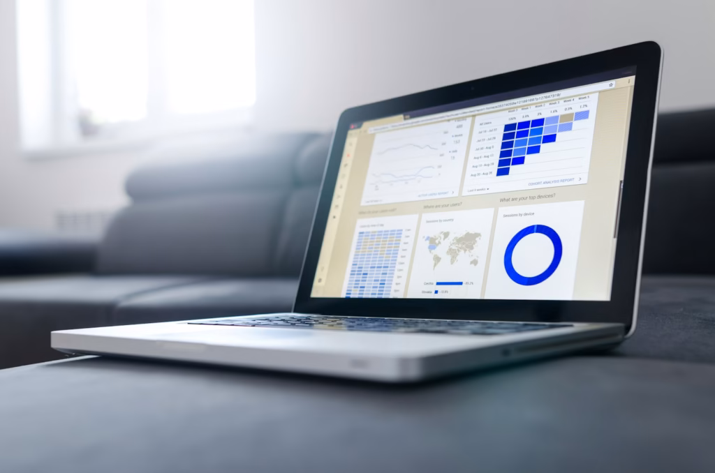 Laptop showing a campaign performance dashboard used to manage Google Ads campaigns