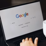 Laptop open on Google search to diagnose a website not showing up on Google