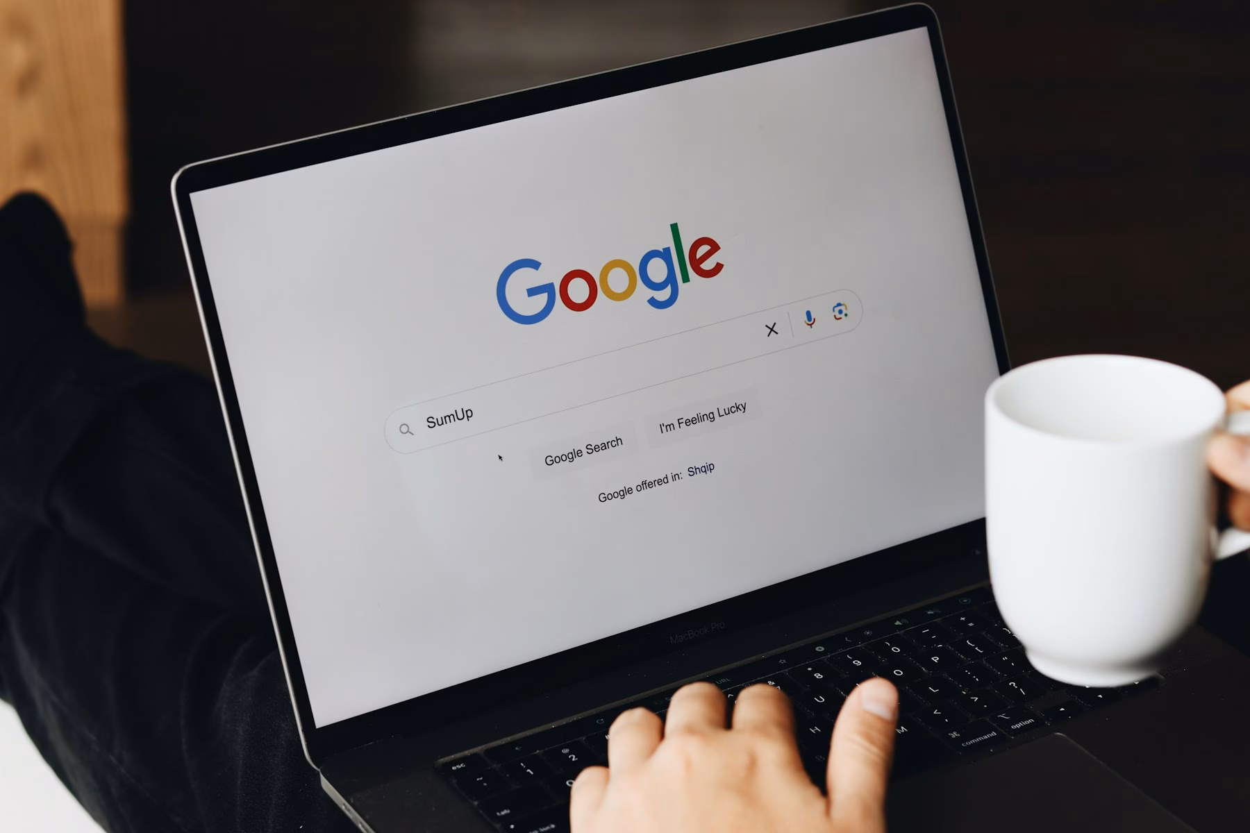 Laptop open on Google search to diagnose a website not showing up on Google